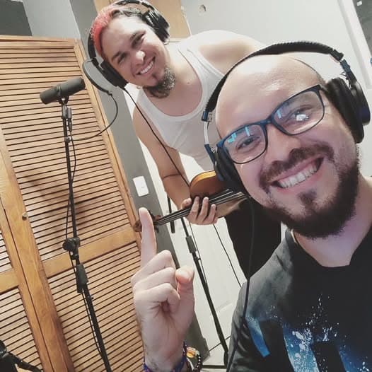 Angel Balcazar recording violin and vocal harmonies for Wonderful and Free