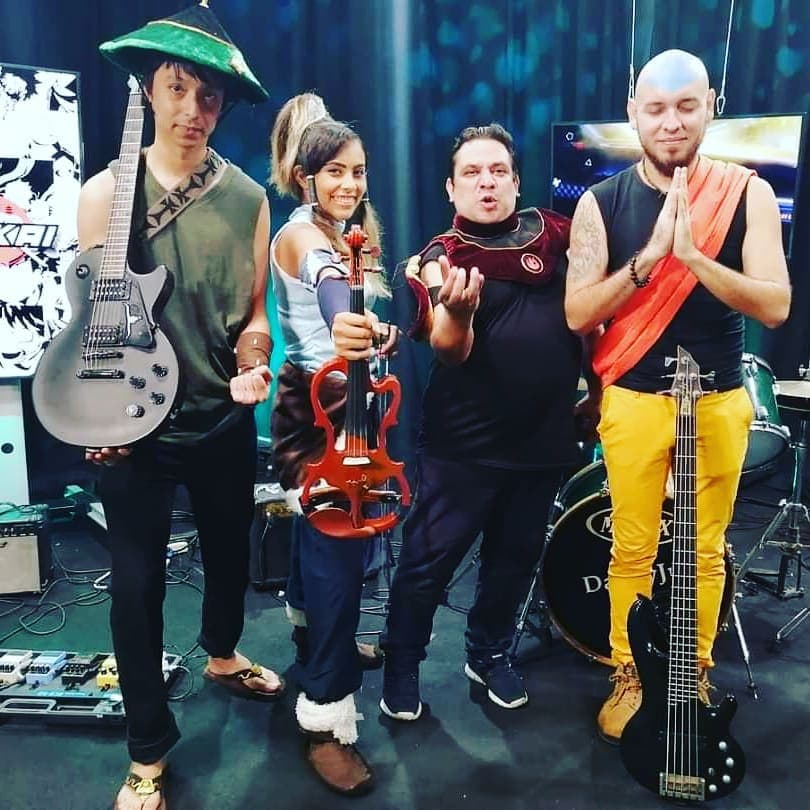 dressed_as_aang_from_avatar_at_comic_sekai_puerto_vallarta_tv_mar_playing_bass_dragon_de_jazmin-1756542717820 cerberus